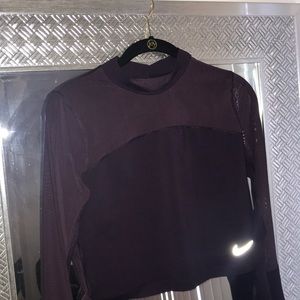 Purple turtle neck Nike shirt
